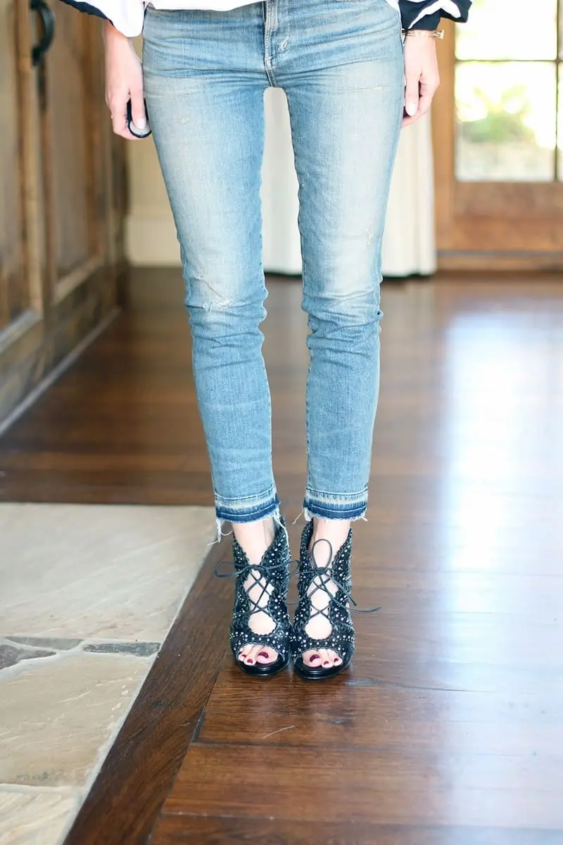 erin busbee of busbeestyle wearing an MLM label off shoulder top and skinny cropped jeans by citizens of humanity with gorjana necklace