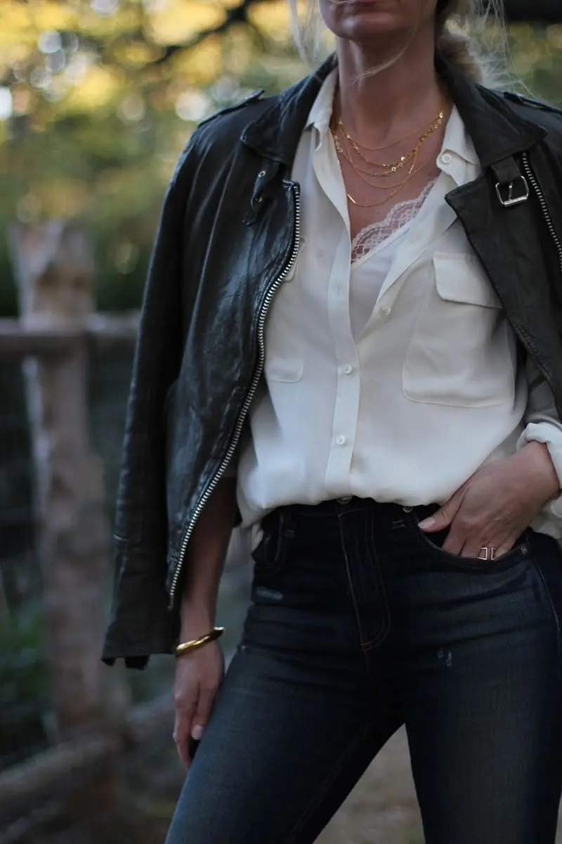 green leather moto jacket by doma paired with equipment slim signature blouse and rag & bone skinny jeans, a gorjana layered gold necklace and python booties
