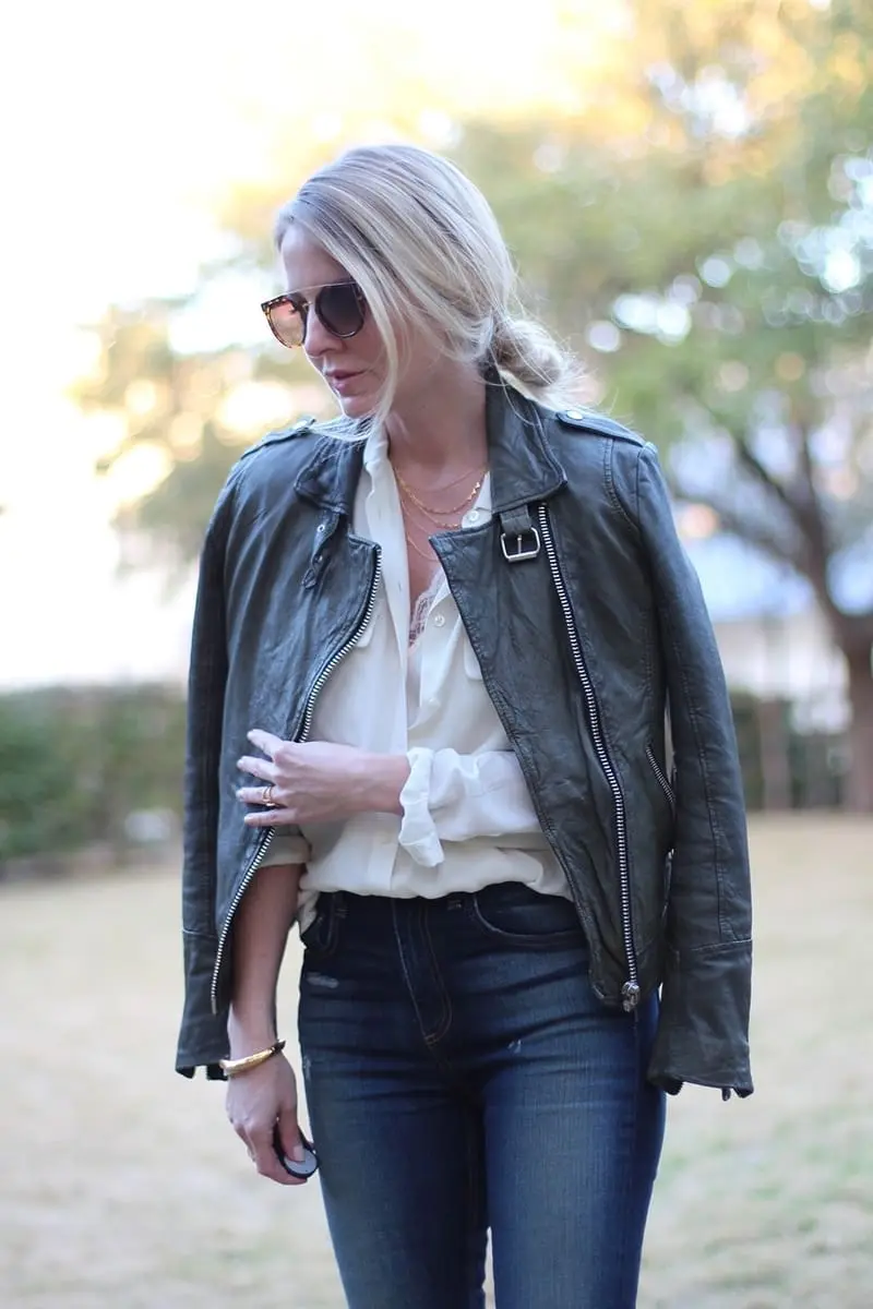 green leather moto jacket by doma paired with equipment slim signature blouse and rag & bone skinny jeans, a gorjana layered gold necklace and python booties