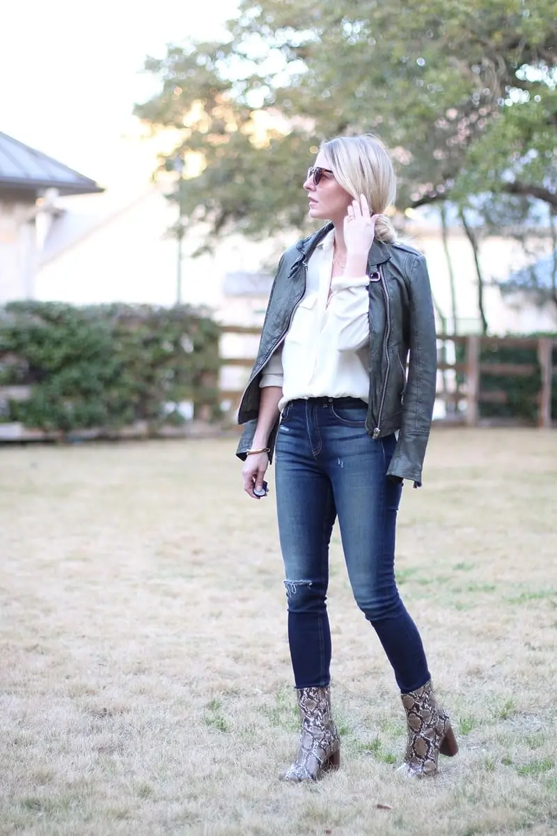 green leather moto jacket by doma paired with equipment slim signature blouse and rag & bone skinny jeans, a gorjana layered gold necklace and python booties