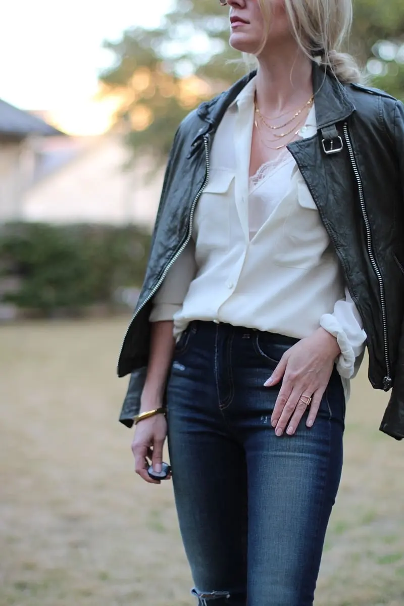green leather moto jacket by doma paired with equipment slim signature blouse and rag & bone skinny jeans, a gorjana layered gold necklace and python booties
