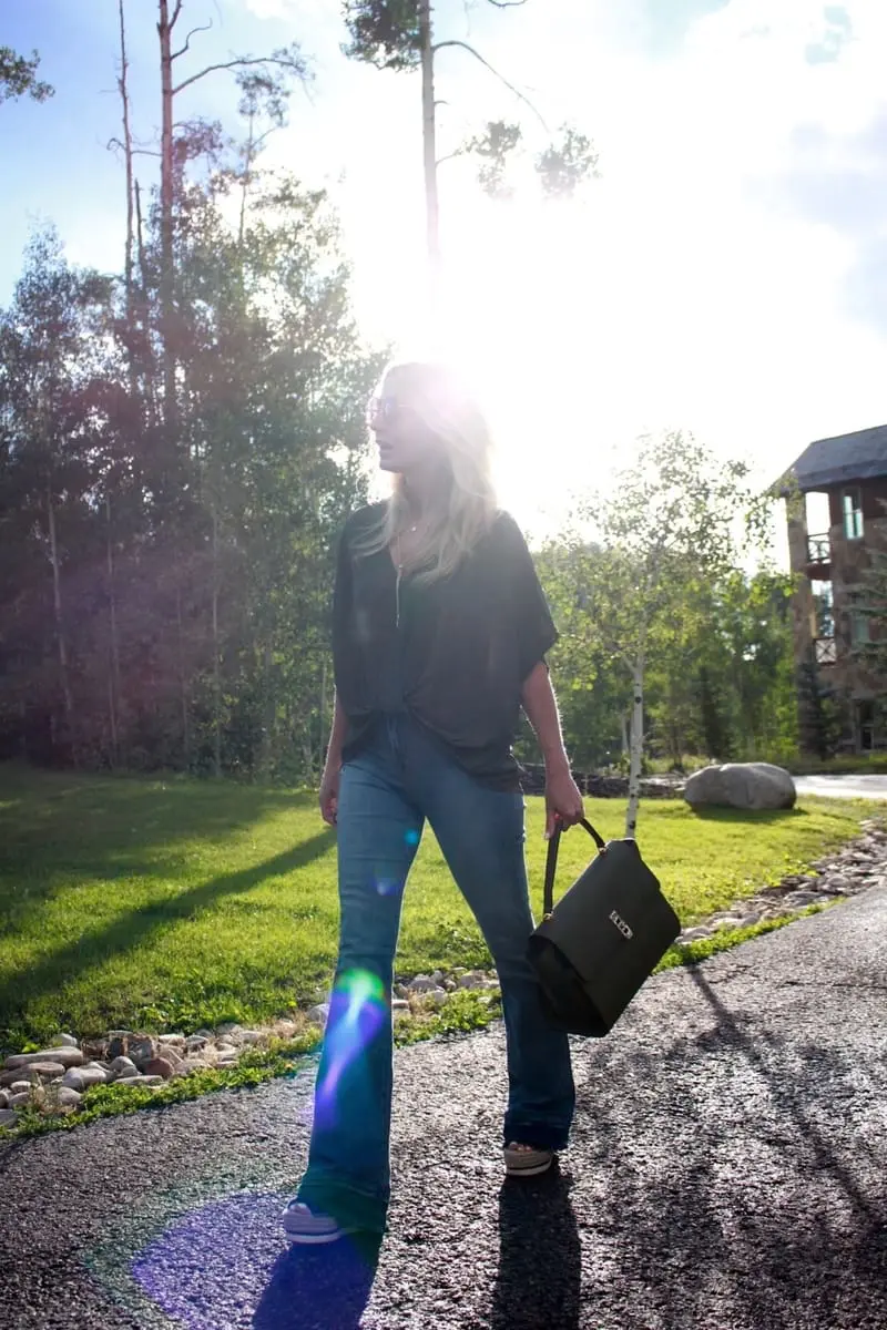 Green Handbag, dark green, army green, uptown satchel, top handle bag, flared jeans, v-neck blouse, green top, round sunglasses
