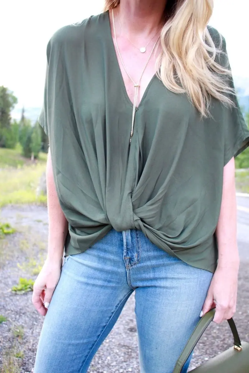 Green Handbag, dark green, army green, uptown satchel, top handle bag, flared jeans, v-neck blouse, green top, round sunglasses