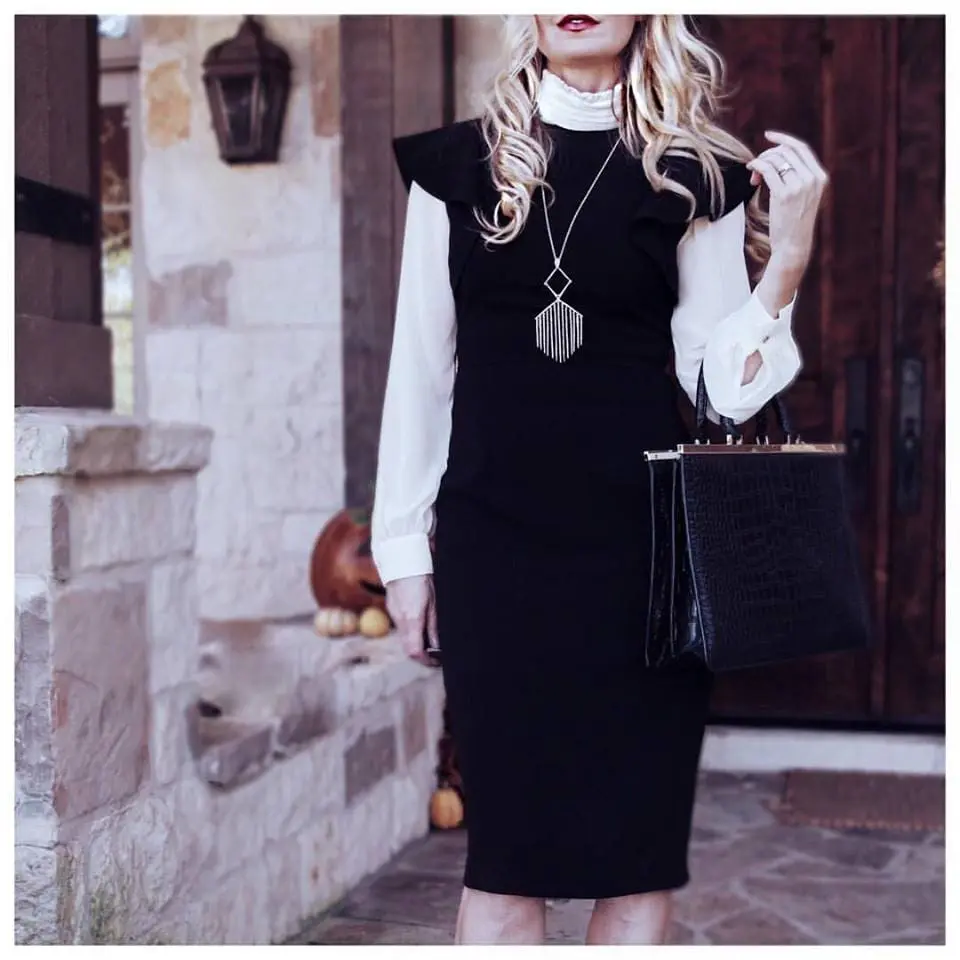 erin busbee wearing a nordstrom ruffle sleeve dress by chelsea28 from nordstrom with a vince camuto blouse and alexis bittar pendant necklace