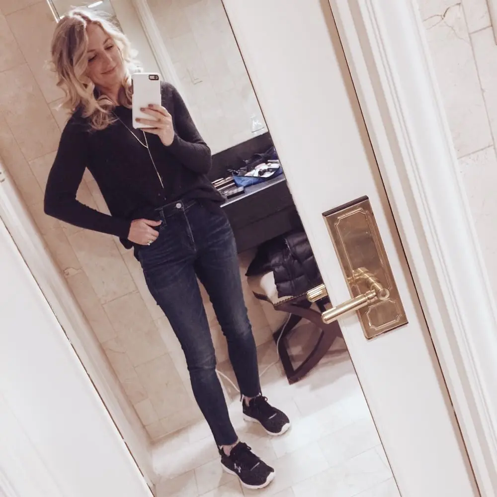 the outfit idea for the nYC marathon, comfy, casual, with cashmere nordstrom sweater, high low hem jeans carlie by citizens and under armour sneakers in black