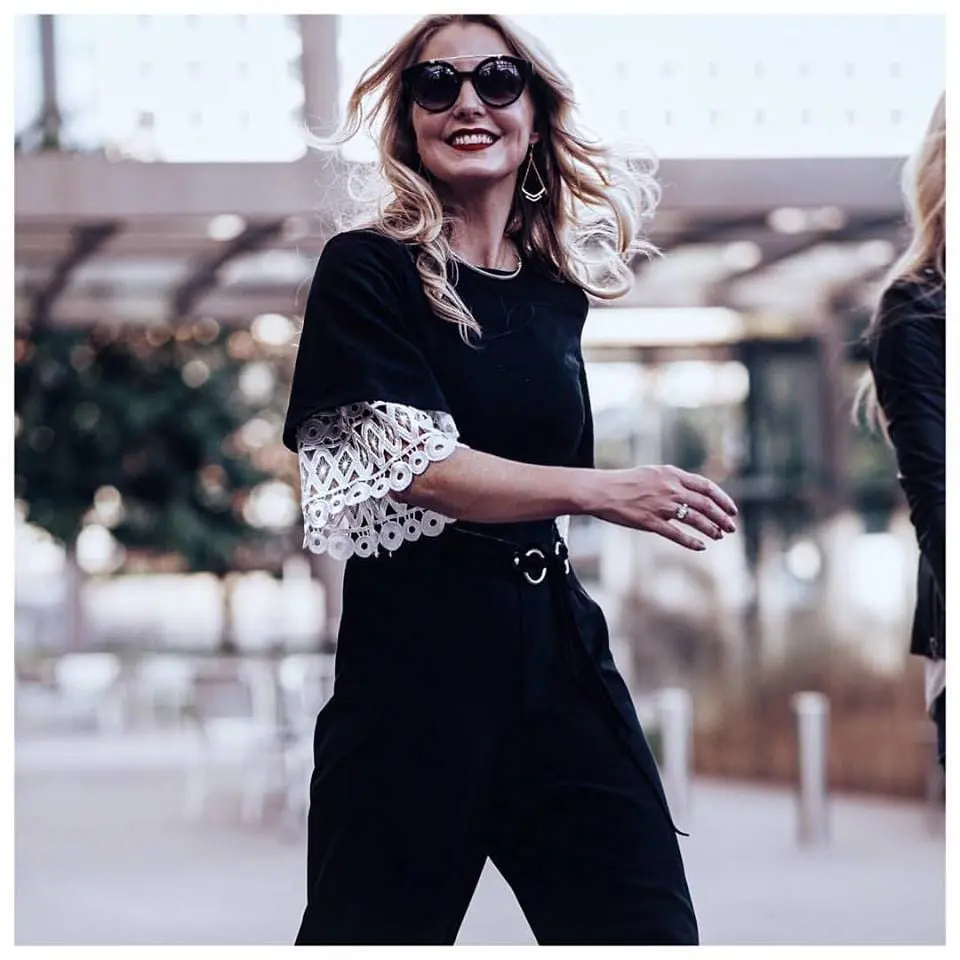 black kimono sleeve jumpsuit from asos layered over a chicwish white lace top 
