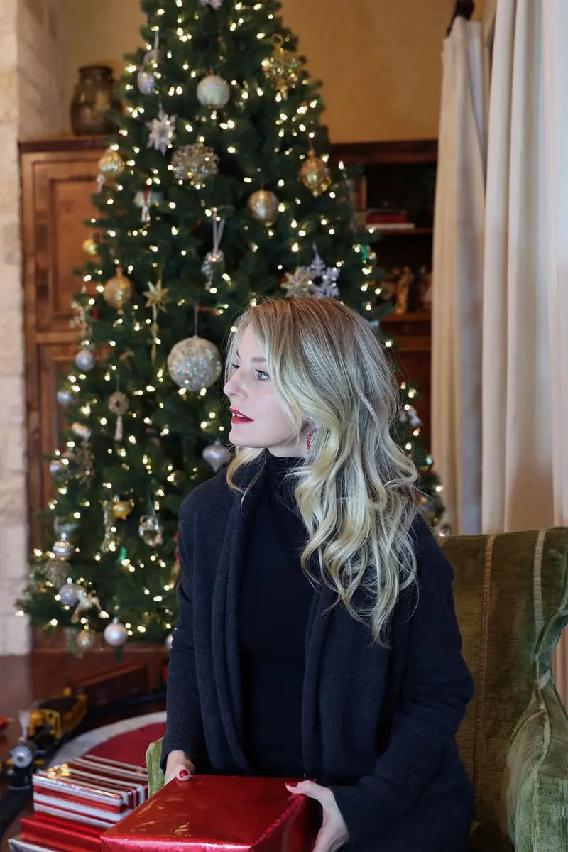 Jewelry gift ideas, wrapping presents in my cozy, soft and warm charcoal gray cocoon cardigan by leith from nordstrom by the Christmas tree