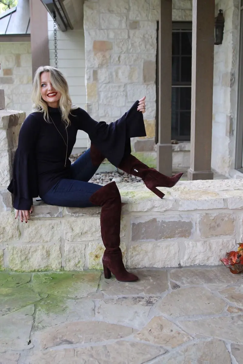 beautiful burgundy suede over the knee boots by Marc Fisher paired with skinny jeans and a bell sleeve sweater gives a subtle 70's vibe