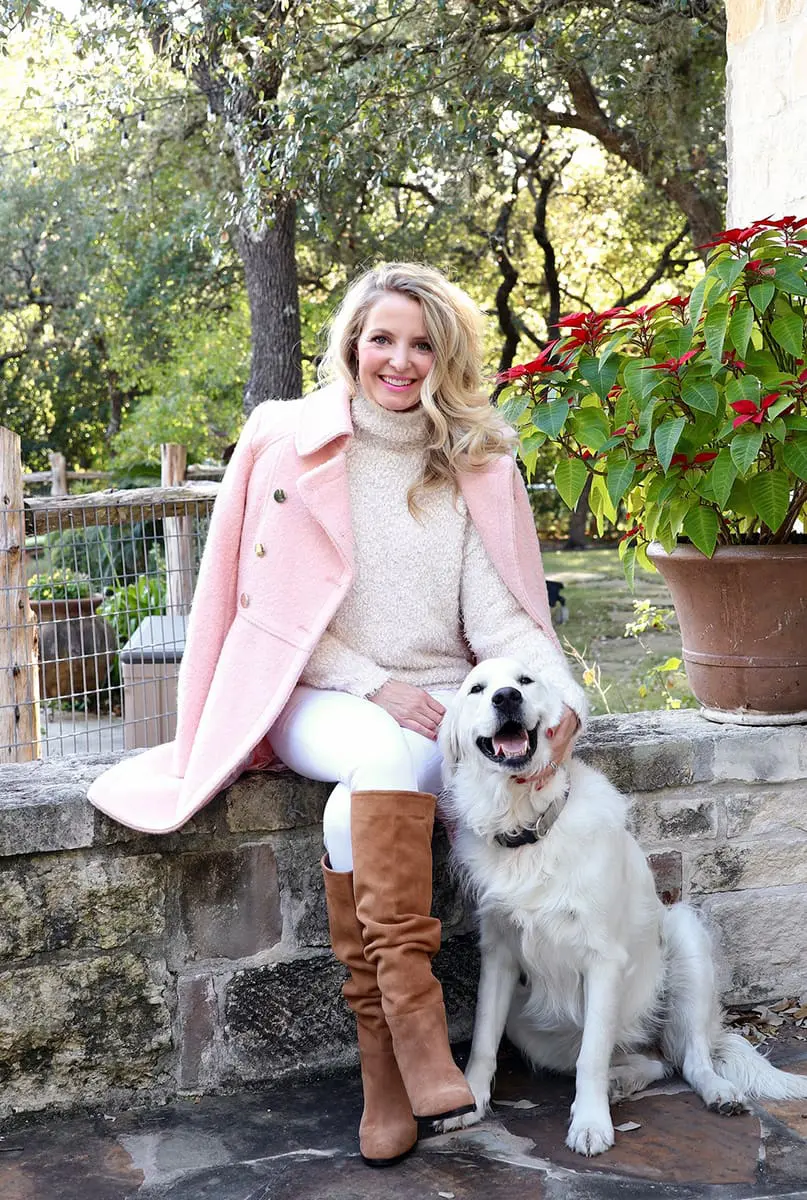 boucle pink coat with fuzzy pink sweater, paired with white jeans and suede scrunchy sam edelman boots