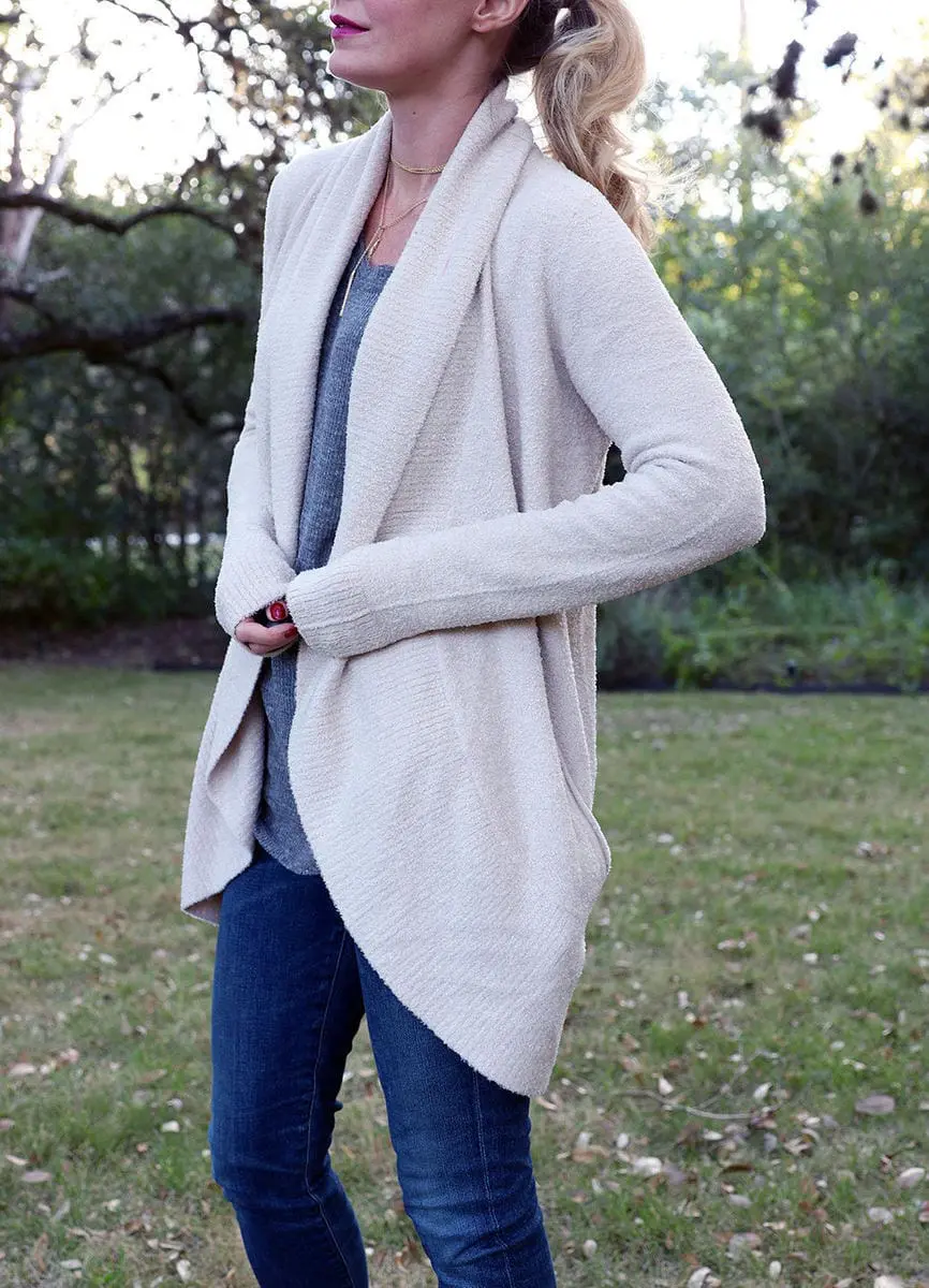 my favorite cozy sweater of the season is this white barefoot dreams cardigan from nordstrom