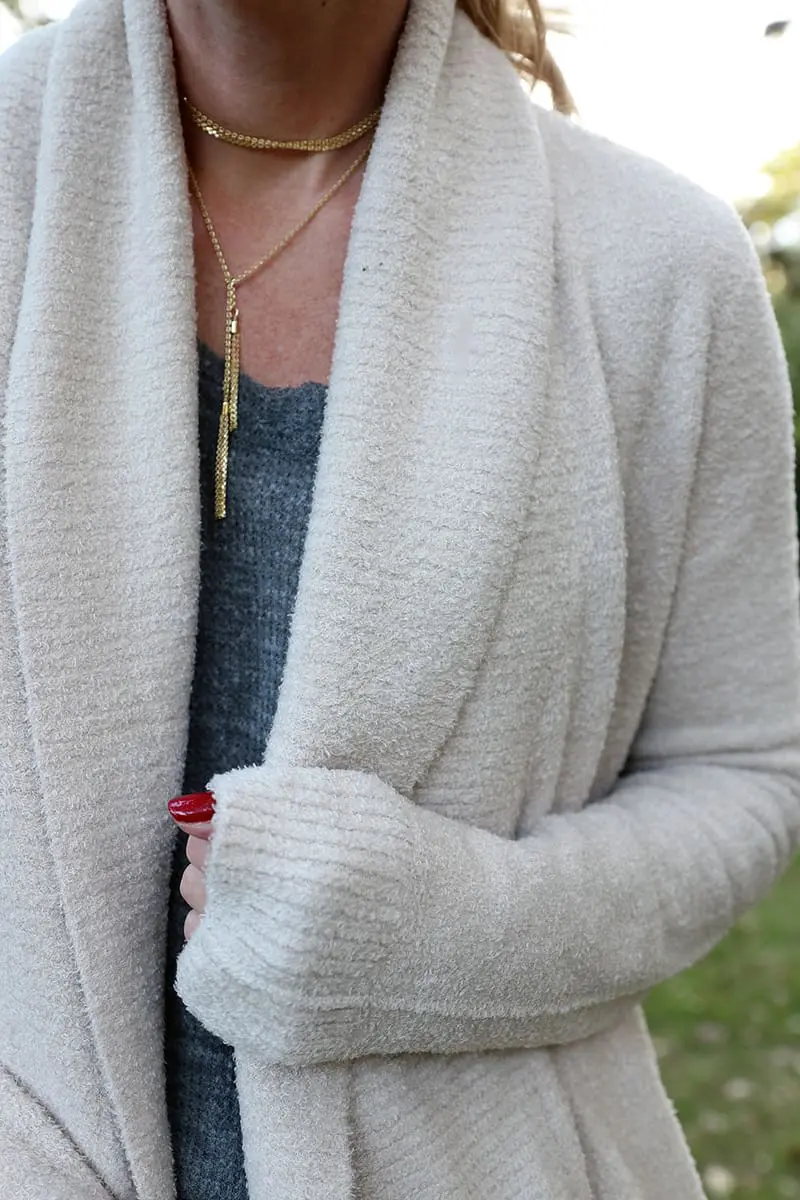 when you look closely at the texture of this white cardigan sweater by barefoot dreams you can see how cozy it is