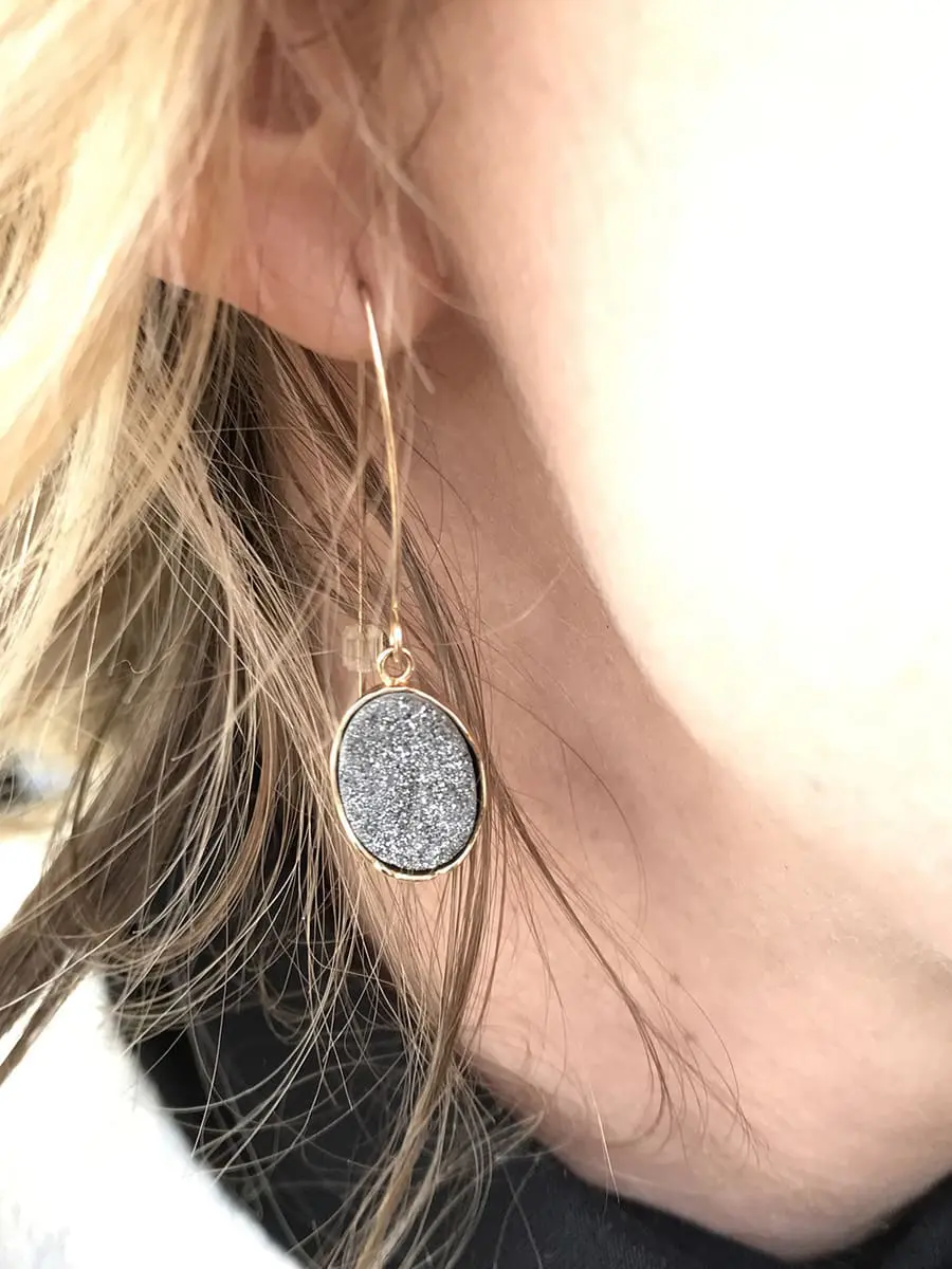 beautiful drop earrings by baublebar called the druzy in gray stone with gold hardware