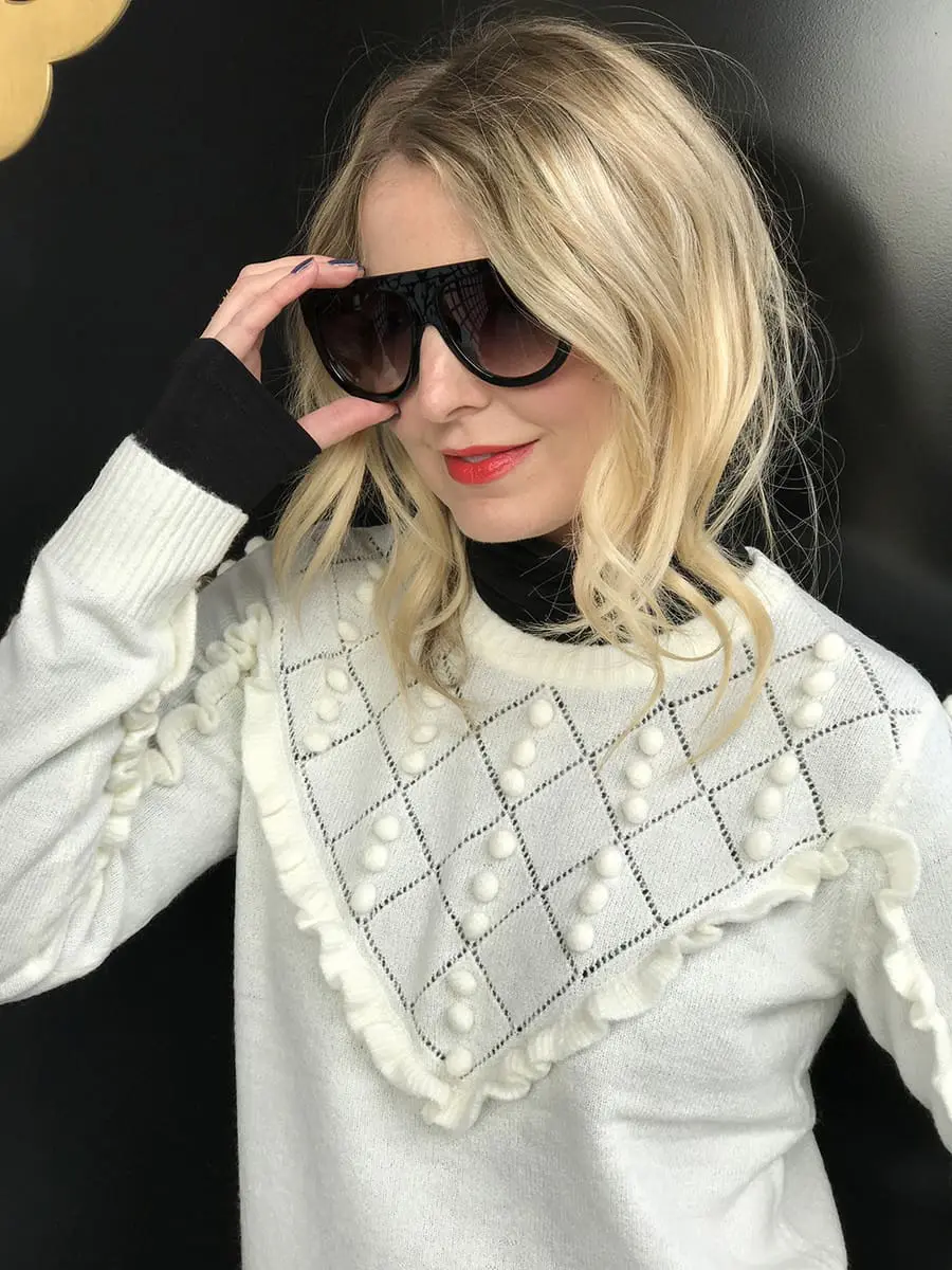 Givenchy look-a-like sunglasses with flat top from Amazon fashion for only $10 and a beautiful pom pom sweater by Topshop in off-white or ivory, with a bright red Milani "empress" lip