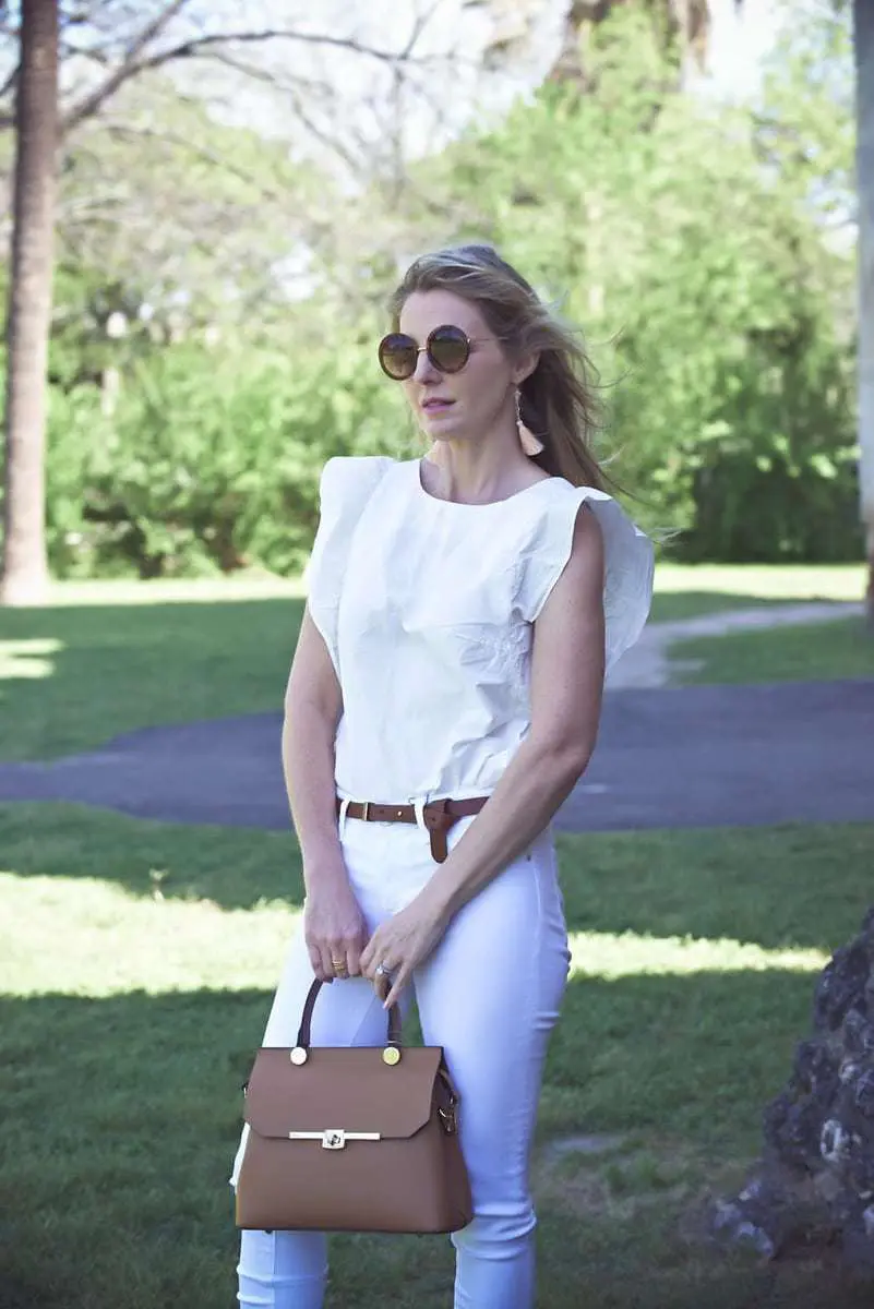 Spring top trends this spring fashion season curated by Erin Busbee fashion blogger and youtuber from Busbeestyle including ruffle tops, off shoulder tops, and cold shoulder tops from Neiman Marcus Last Call