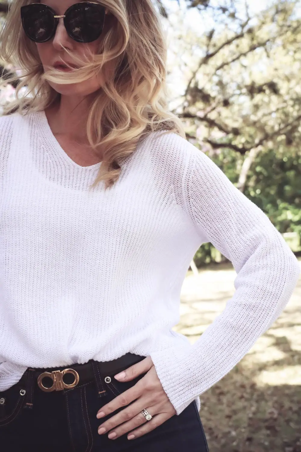 Erin Busbee fashion blogger and youtuber on busbeestyle wearing white cotton sweater v-neck by Eileen fisher