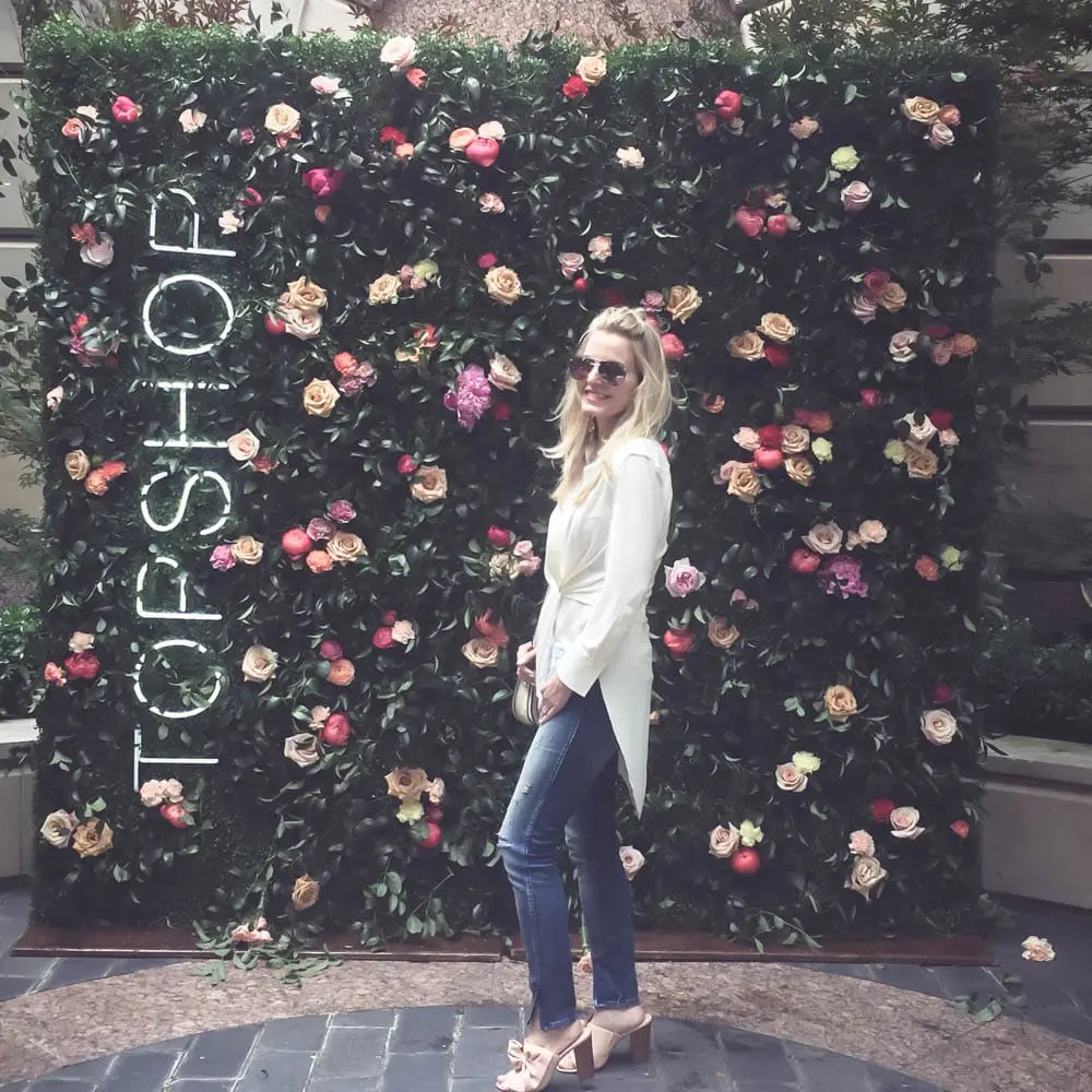 Reward style conference 2017 at hotel crescent court, fashion blogger and fashion youtuber erin busbee wearing norma kamali tie front top, amo denim jeans with twist front, lace cami, mules by avec les filles and chloe nile bracelet bag