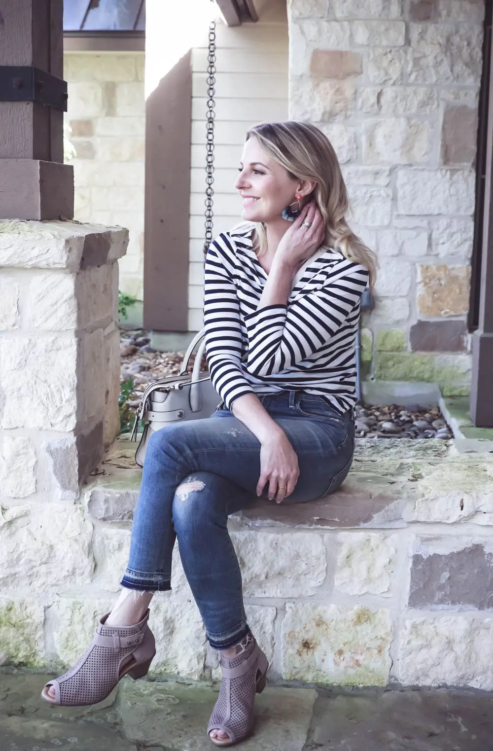 What I Wore featuring three outfits worn by fashion blogger and youtuber from san antonio, texas, erin busbee of busbeestyle.com // In this picture, wearing gorgeous pastel pom pom statement earrings from Baublebar, striped tee from J.Crew, Citizens of Humanity rocket crop vintage jeans in miramar, and Earth Brands peep toe perforated booties 