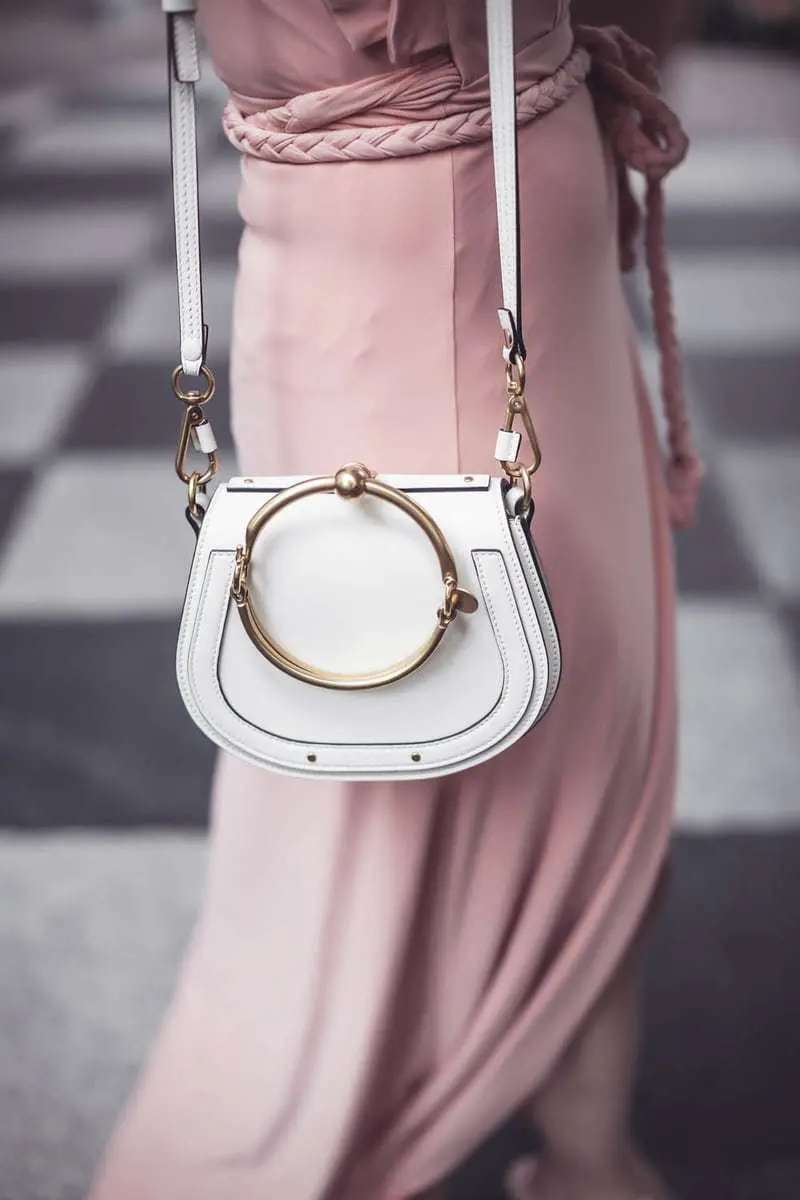 Pink, peach, blush, nude dresses are very much on trend now, I love this Misa wrap dress with the flutter sleeve that I paired with peach bow mules by Avec les filles and the chloe nile bag from Saks Fifth Avenue
