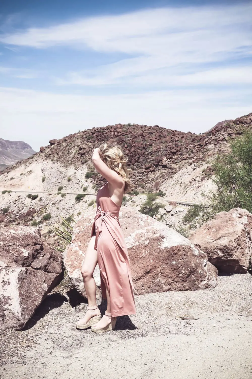 Wrap Dress in blush nude color on fashion blogger and fashion youtuber erin busbee of busbestyle, san antonio, texas, shot near Big Bend National Park in West Texas along the Rio Grande, fashion ideas for women over 40 