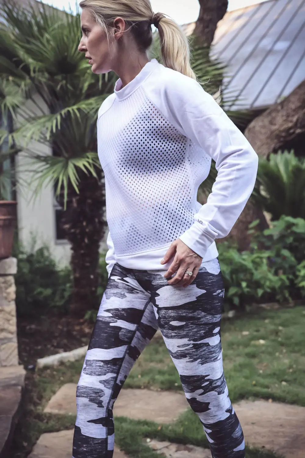 Sexy, edgy, and stylish workout clothes for women over 40, fashion over 40, fashion forward activewear, on Erin Busbee, Busbeestyle.com, fashion blogger and youtuber, look at brands like terez, alo yoga, beyond yoga