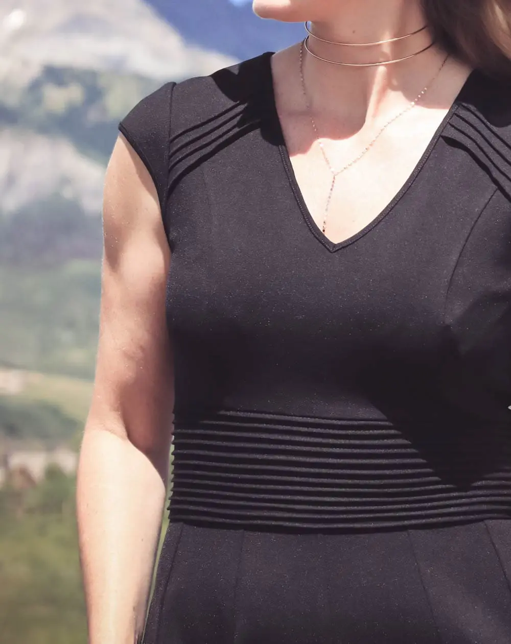 Wear Now, Wear Later, little black dress fit and flare by Eliza J, styling with Dolce Vita studded sandals, on fashion blogger Erin Busbee, over 40, in telluride, colorado