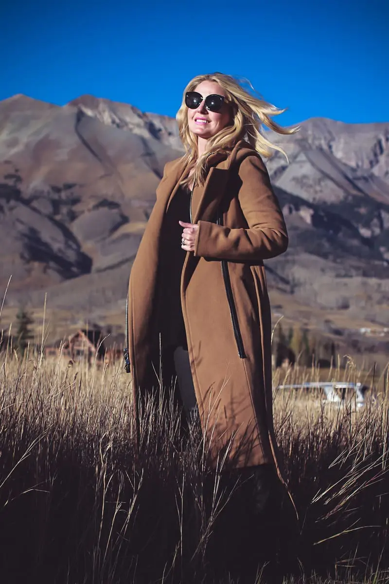 Top 5 winter coats including this gorgeous camel coat by Mackage with black leather trim on fashion blogger Erin Busbee of Busbee Style in Telluride Colorado, Colorado blogger, fashion over 40