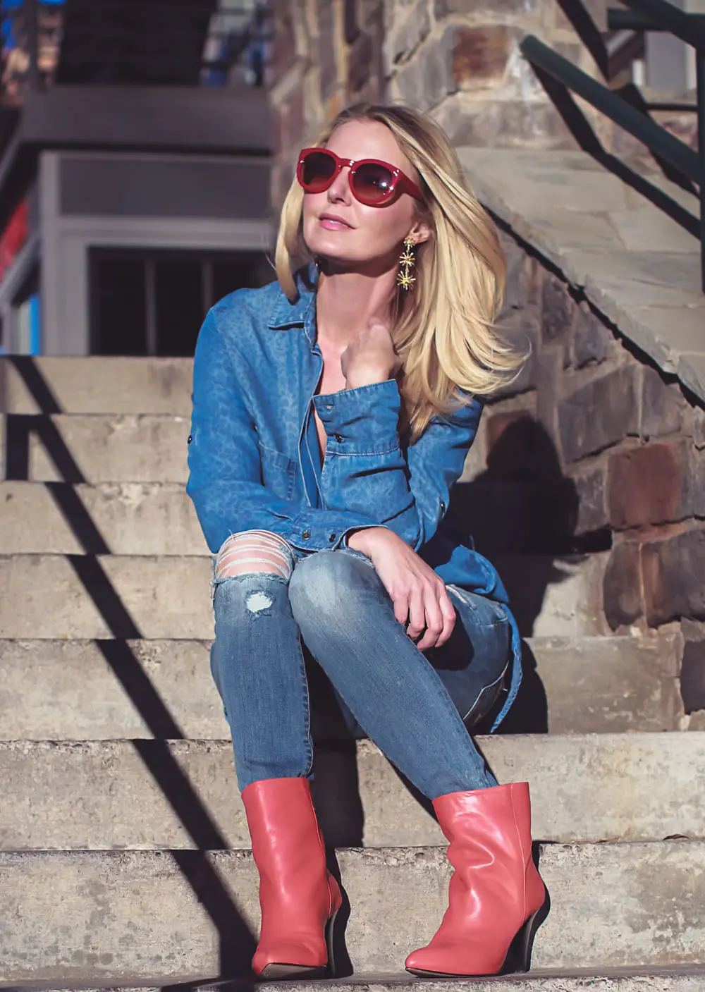 How to wear red boots, red booties by Dolce Vita with denim on denim look, American Eagle jeans, Bella Dahl chambray shirt, on fashion blogger over 40, Erin Busbee of Busbee Style in Mountain Village, Colorado
