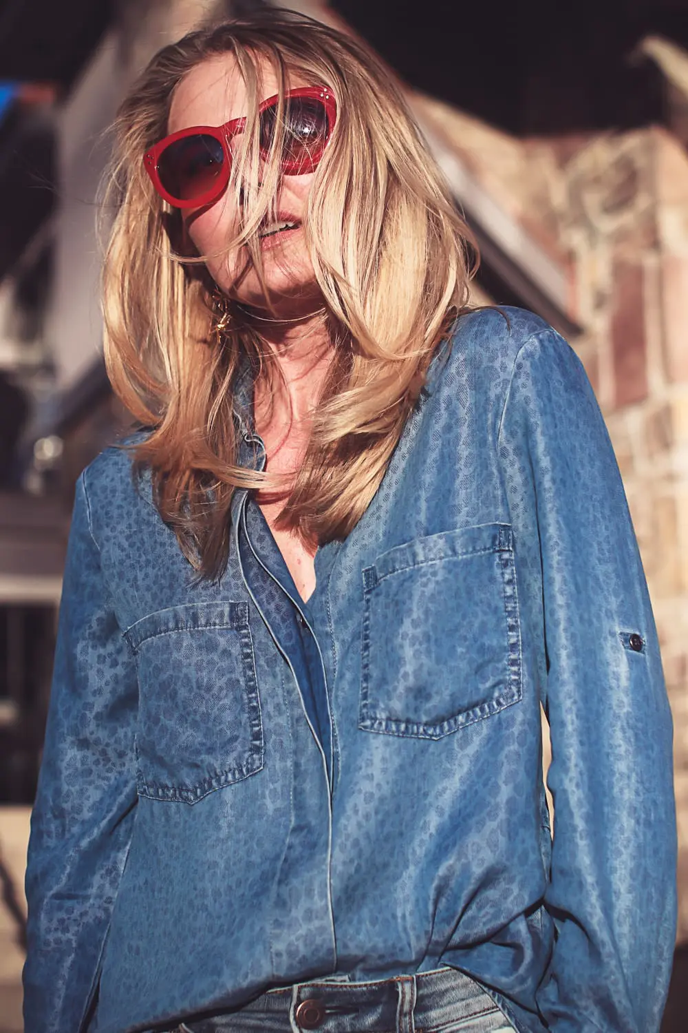 How to wear red boots, red booties by Dolce Vita with denim on denim look, American Eagle jeans, Bella Dahl chambray shirt, on fashion blogger over 40, Erin Busbee of Busbee Style in Mountain Village, Colorado