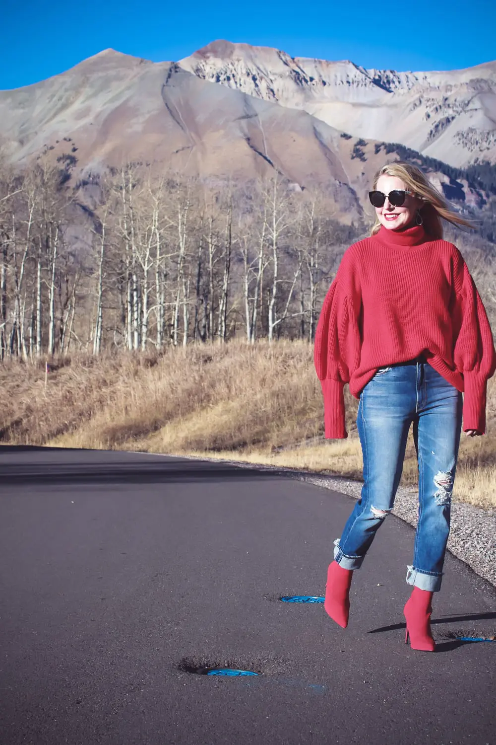 Sock Booties, what are they, how to style sock booties, featuring these red Steve Madden sock booties, Mother dazzler jeans, and a red oversized topshop turtleneck sweater