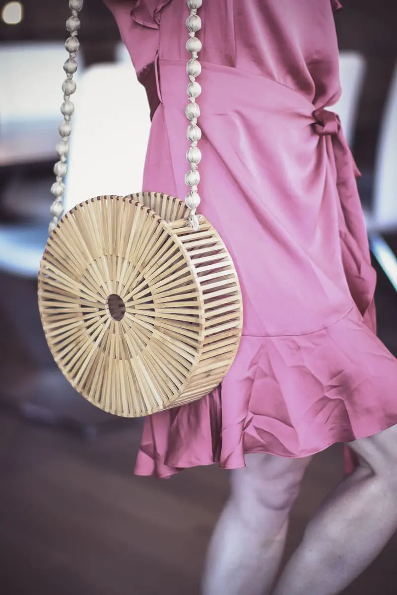 Basket bags or straw bags, curated by fashion blogger Erin Busbee of BusbeeStyle.com, including Cult Gaia Bag and dupe, round bags, clutches, totes, and large beach totes, female-owned fashion brands