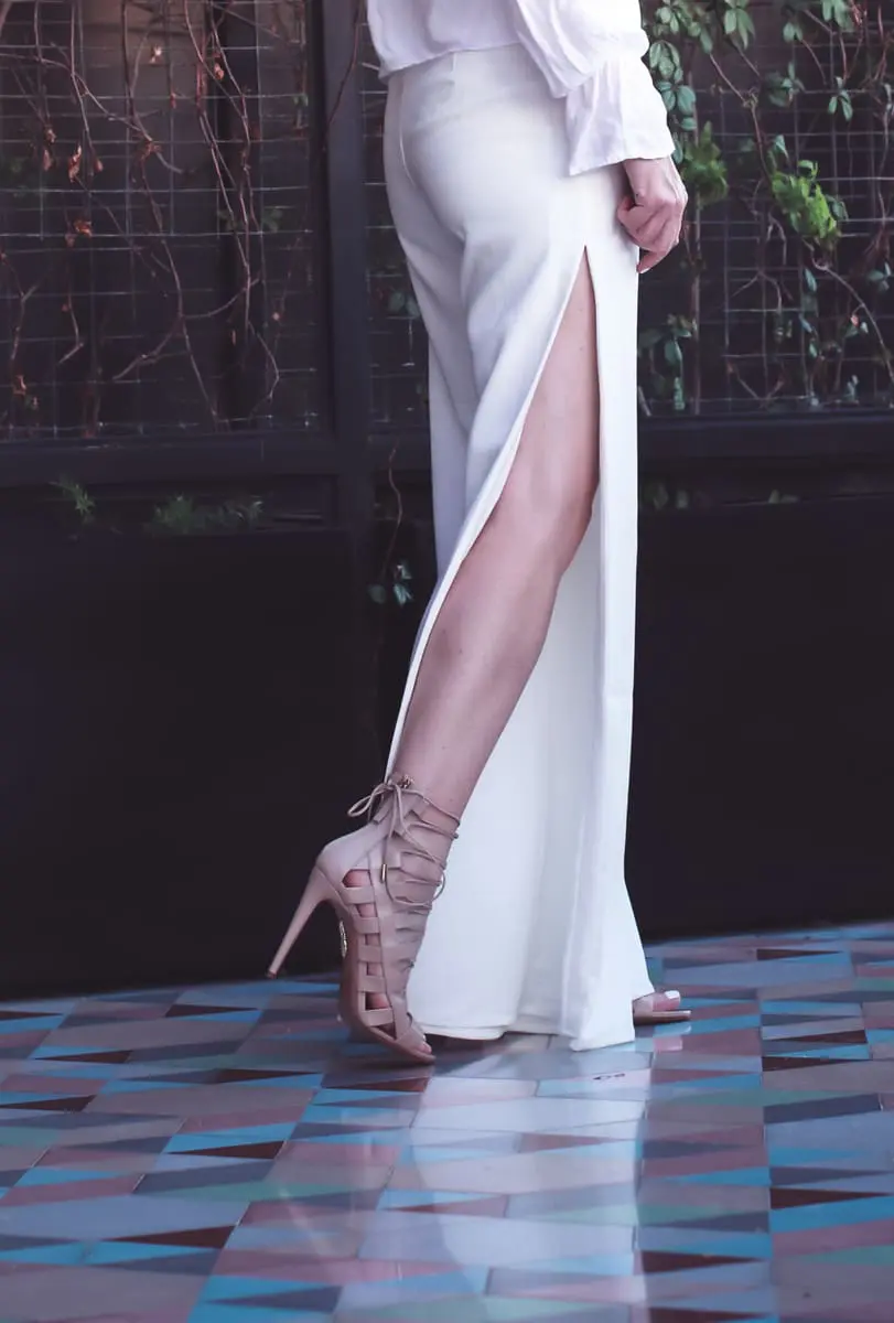Beach picks, high slit, wide leg white pants by Lovers + friends on fashion blogger Erin Busbee of BusbeeStyle.com