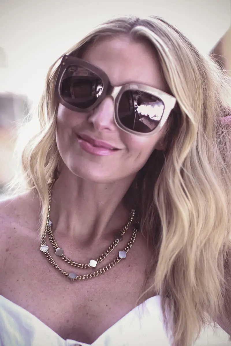 Best accessories featuring a pair of over-sized gold sunglasses from Henri Bendel on fashion blogger Erin Busbee of BusbeeStyle.com 