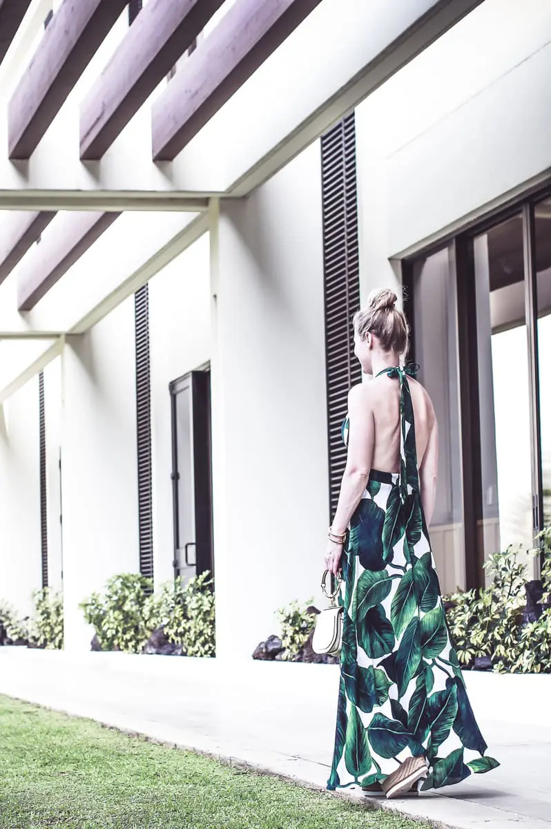 Palm print maxi dress by Milly on blond woman with hair up