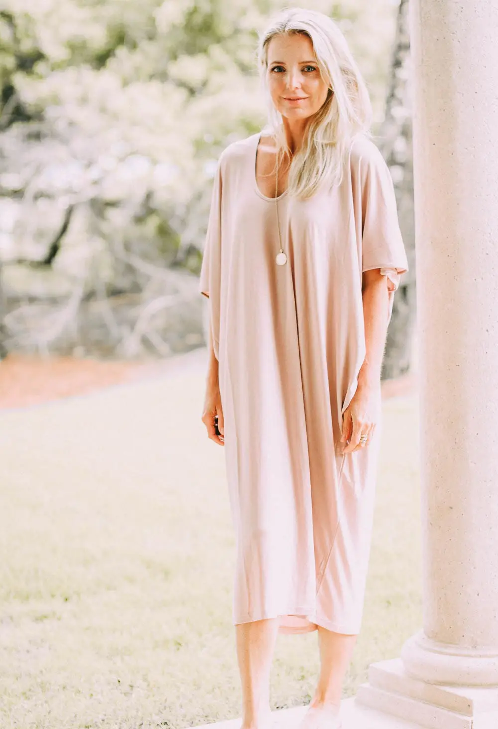 best pajamas, blush toned caftan by Barefoot Dreams on blonde woman