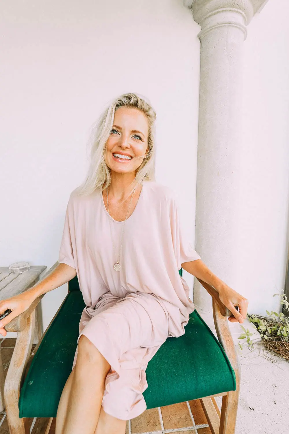 best pajamas, blush toned caftan by Barefoot Dreams on blonde woman
