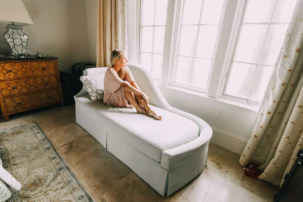 best pajamas, blush toned caftan by Barefoot Dreams on blonde woman