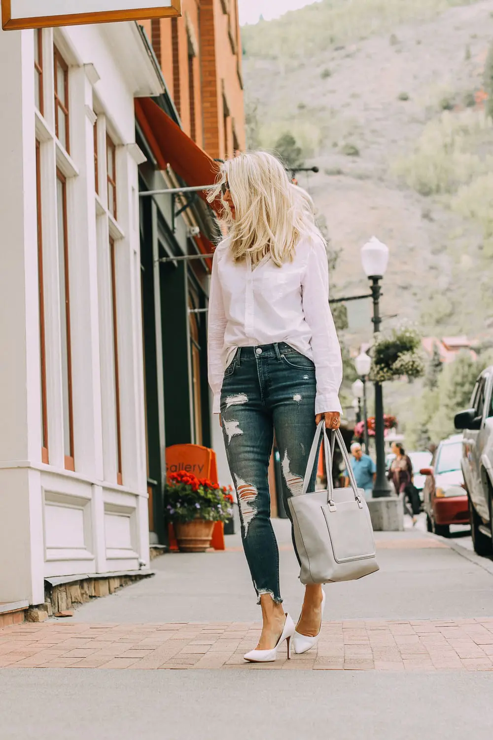 Pumps by Vince Camuto very comfortable paired with Express distressed skinny jeans and a Frank & Eileen white button down shirt and gray Vince Camuto tote bag