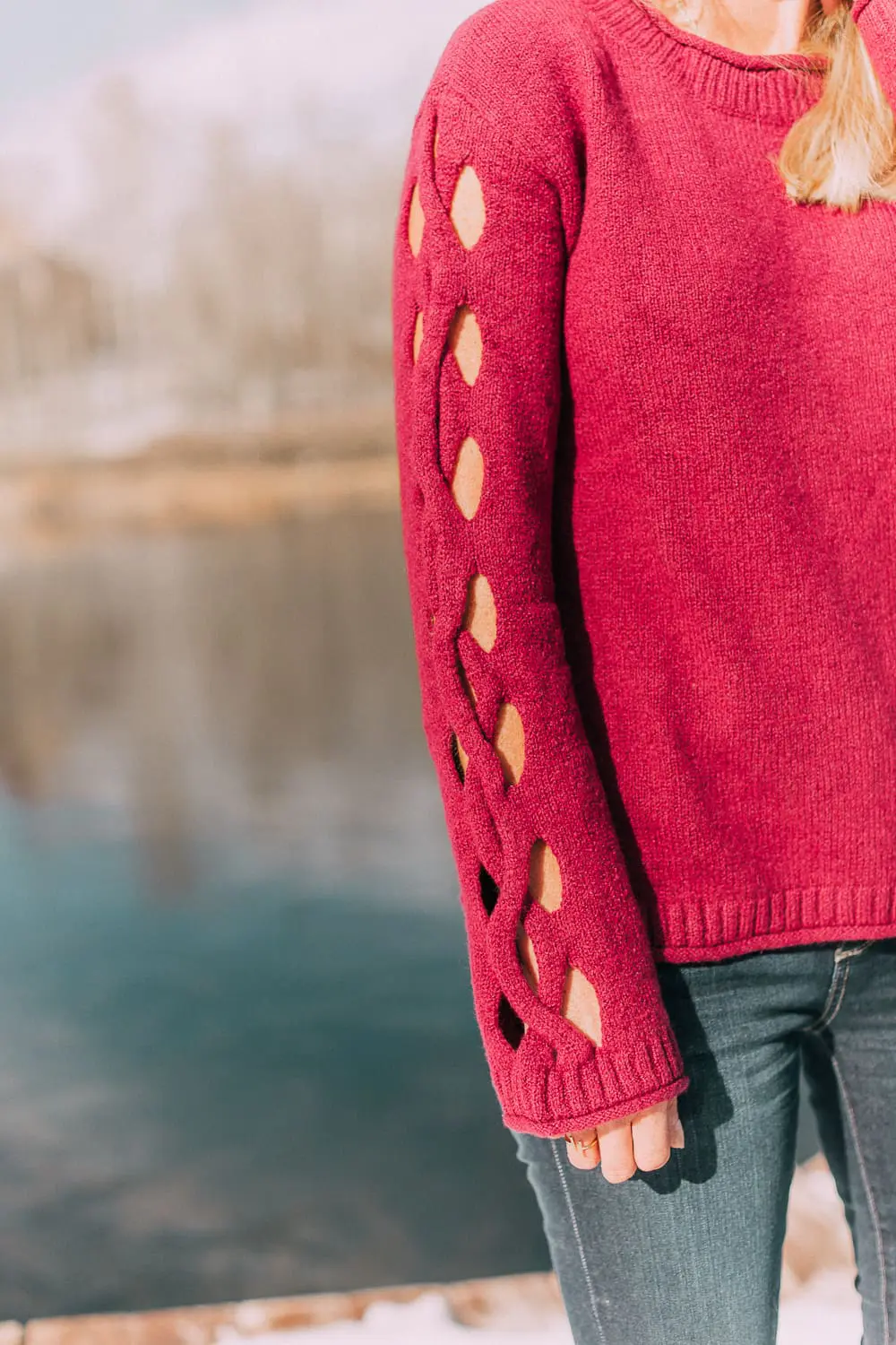 Best sweaters for fall for women 2018 featuring a hot pink crew neck sweater from JCPenney with cutouts on the sleeve on blonde fashion blogger