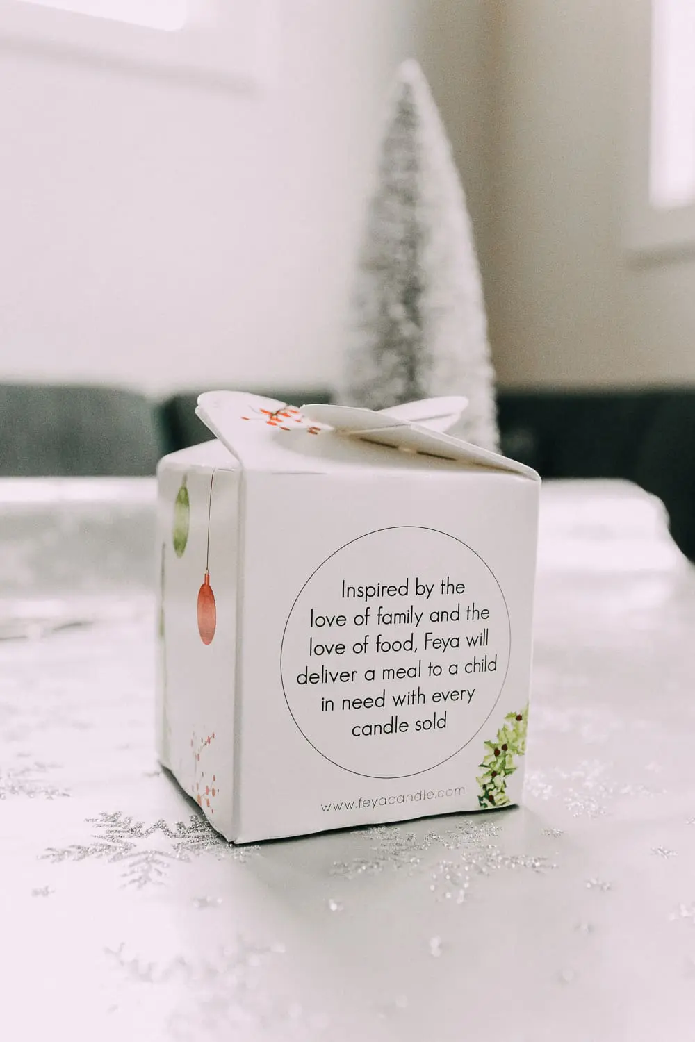 holiday gift ideas from JCPenney featuring a Feya holiday cheer boxed soy candle