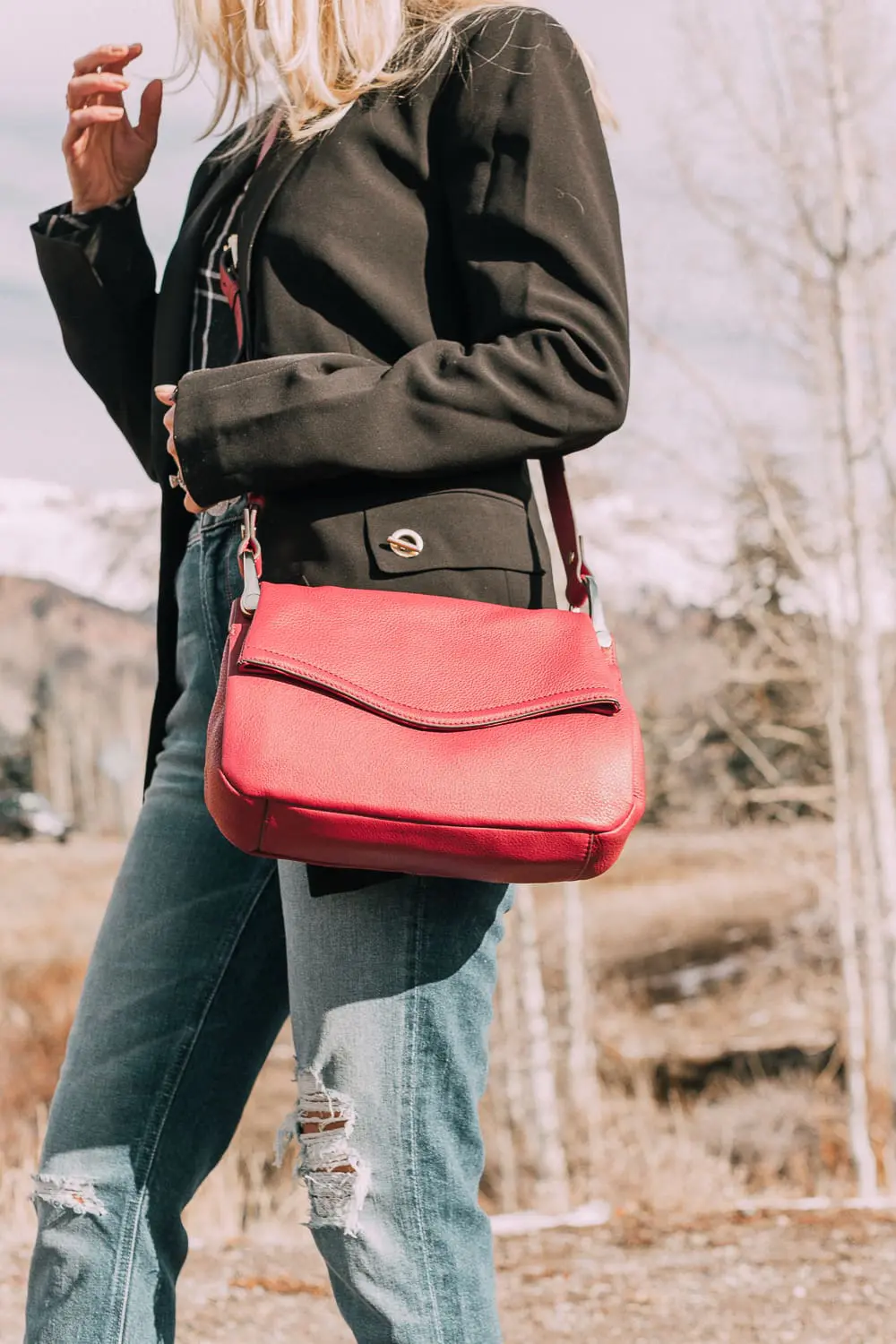 Bootie Trend, styling gray suede short ankle boots by Vince Camuto with Mother cropped jeans, rails black and white plaid shirt, black donna karen blazer and a red crossbody bag on fashion blogger Erin Busbee