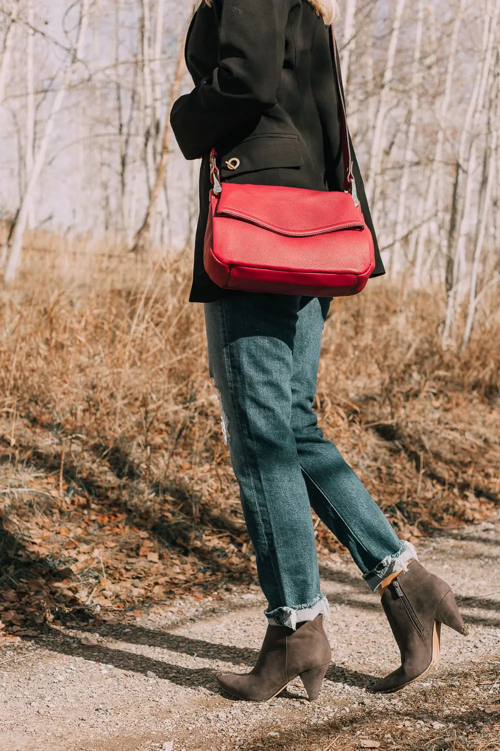 Bootie Trend, styling gray suede short ankle boots by Vince Camuto with Mother cropped jeans, rails black and white plaid shirt, black donna karen blazer and a red crossbody bag on fashion blogger Erin Busbee