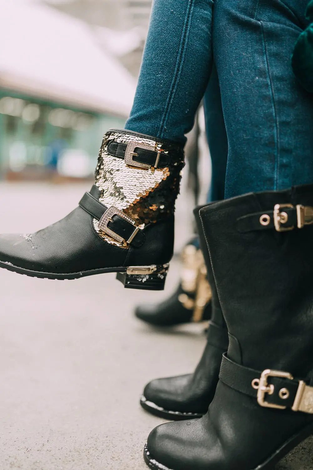 Moto Boots matching mommy and me black and gold moto boots by Vince Camuto on blonde woman and blonde daughter in snow