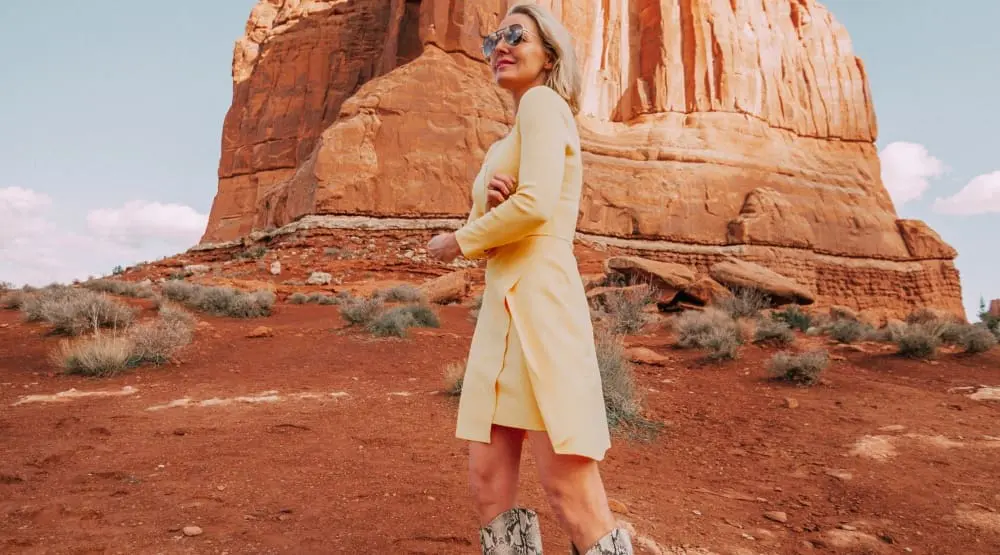 Spring Fashion Trends 2019 featuring neon yellow ALC dress with Schutz python western boots on fashion blogger Erin Busbee