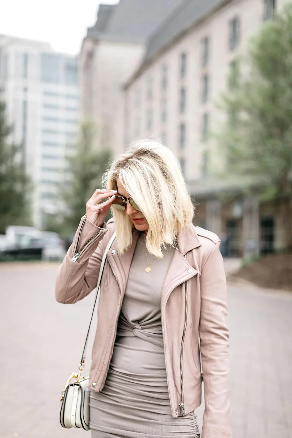 Reward Style Conference 2019, Fashion blogger over 40 Erin Busbee of BusbeeStyle.com wearing a fitted cropped long sleeve top and fitted midi skirt by Made LA from Revolve in Dallas, Texas