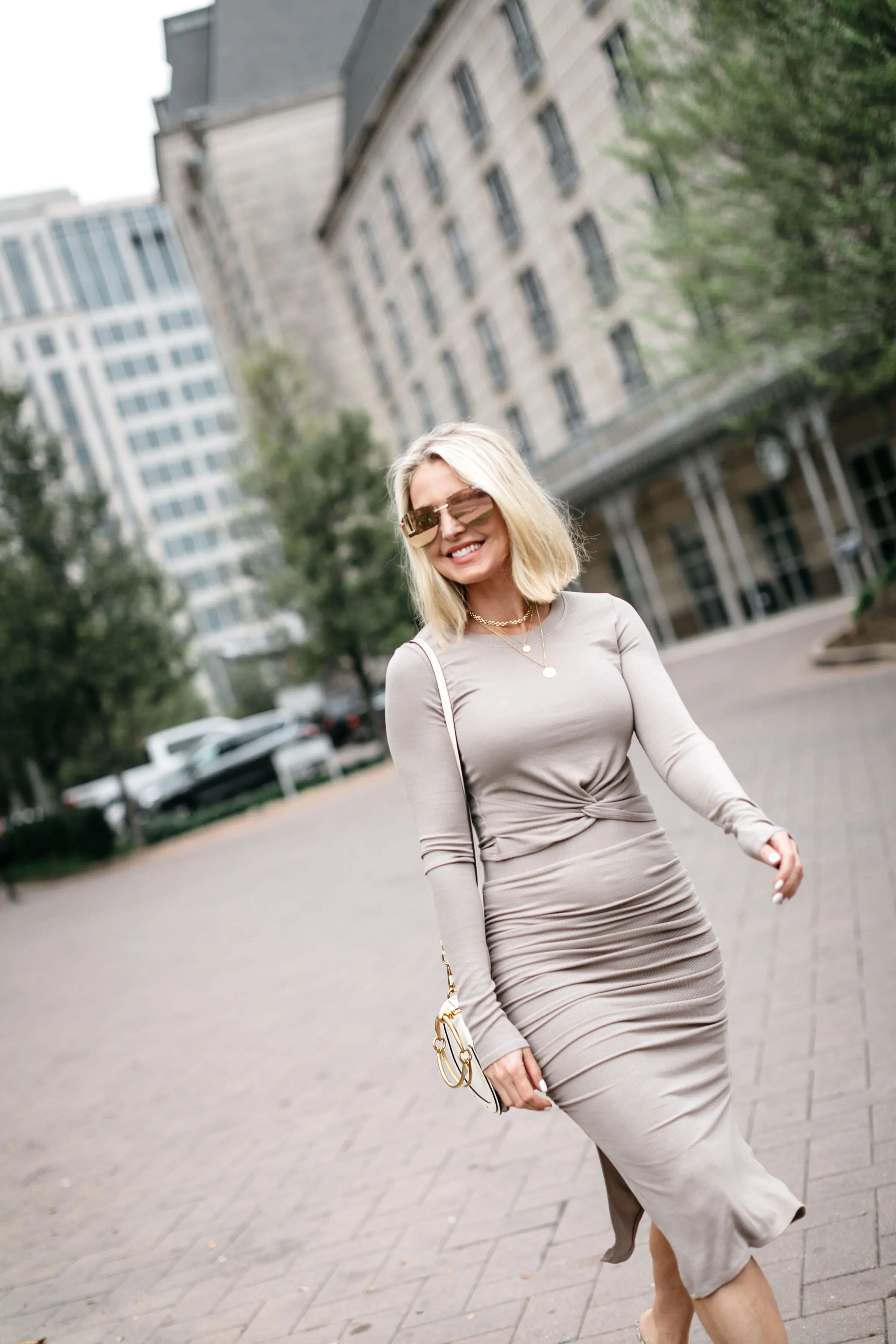Reward Style Conference 2019, Fashion blogger over 40 Erin Busbee of BusbeeStyle.com wearing a fitted cropped long sleeve top and fitted midi skirt by Made LA from Revolve in Dallas, Texas