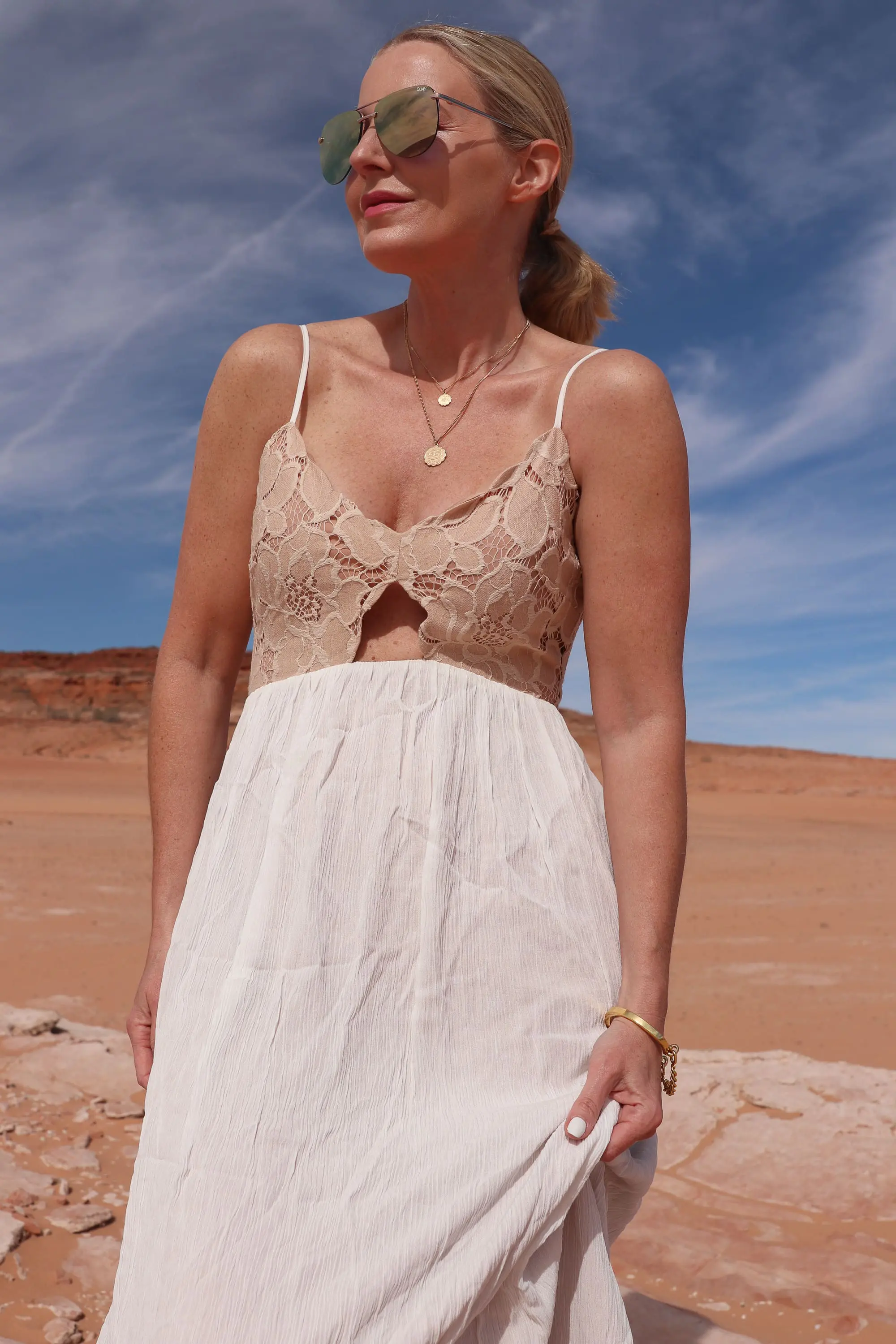 fashion blogger wearing tularosa maxi dress with aviator sunglasses and gold necklaces