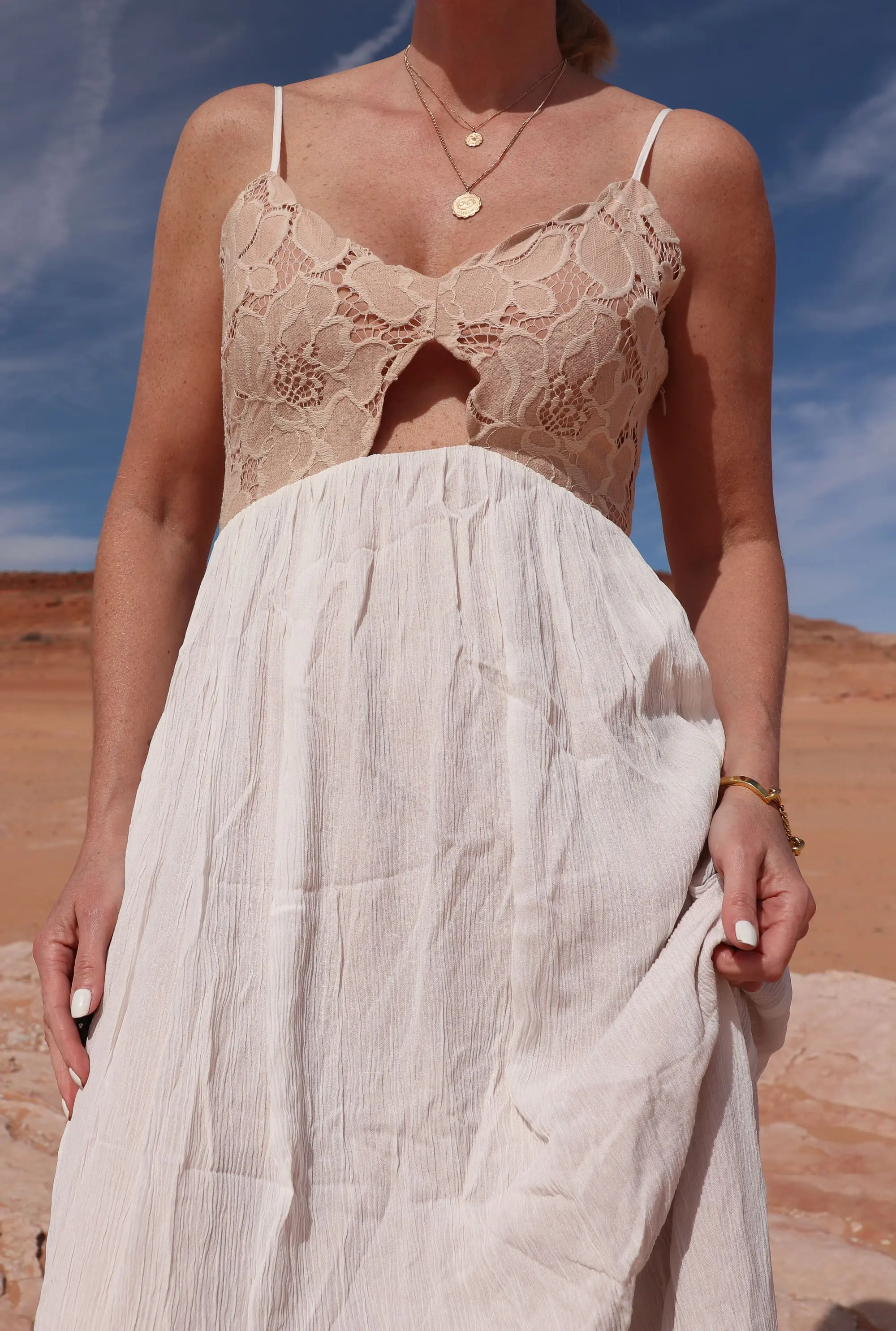 lace tularosa maxi dress worn by fashion blogger with gold necklaces