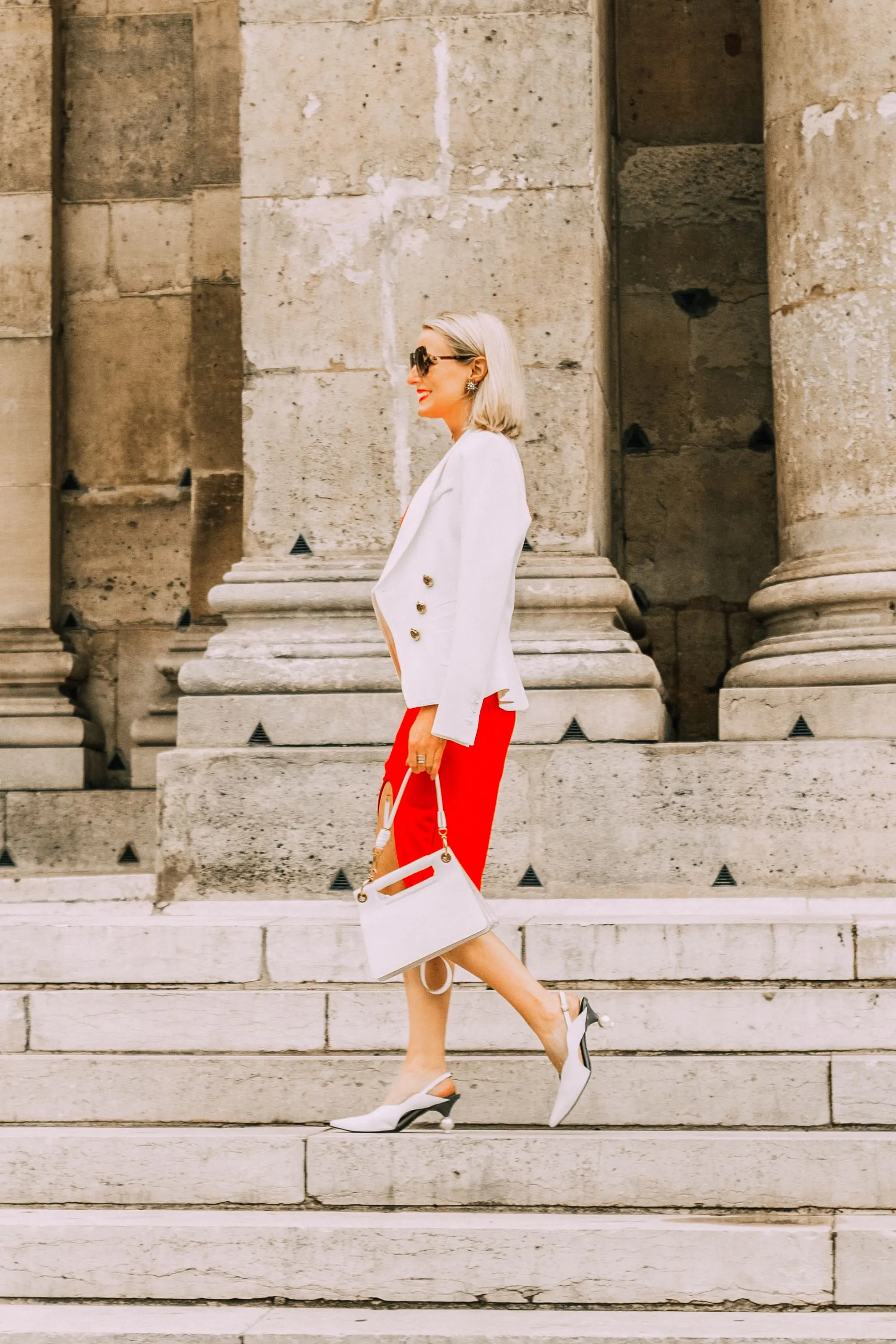 Date Night Dress, Fashion blogger over 40 Erin Busbee of BusbeeStyle.com wearing a red Bailey 44 dress with a white blazer, white Givenchy small whip bag, and white Smythe blazer in Paris, France