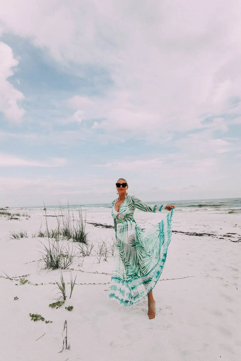 Duster Cover Up, Fashion blogger Erin Busbee of BusbeeStyle.com wearing a We Are Leone palm print duster with a white pom pom swimsuit from Amazon on the beach in Florida