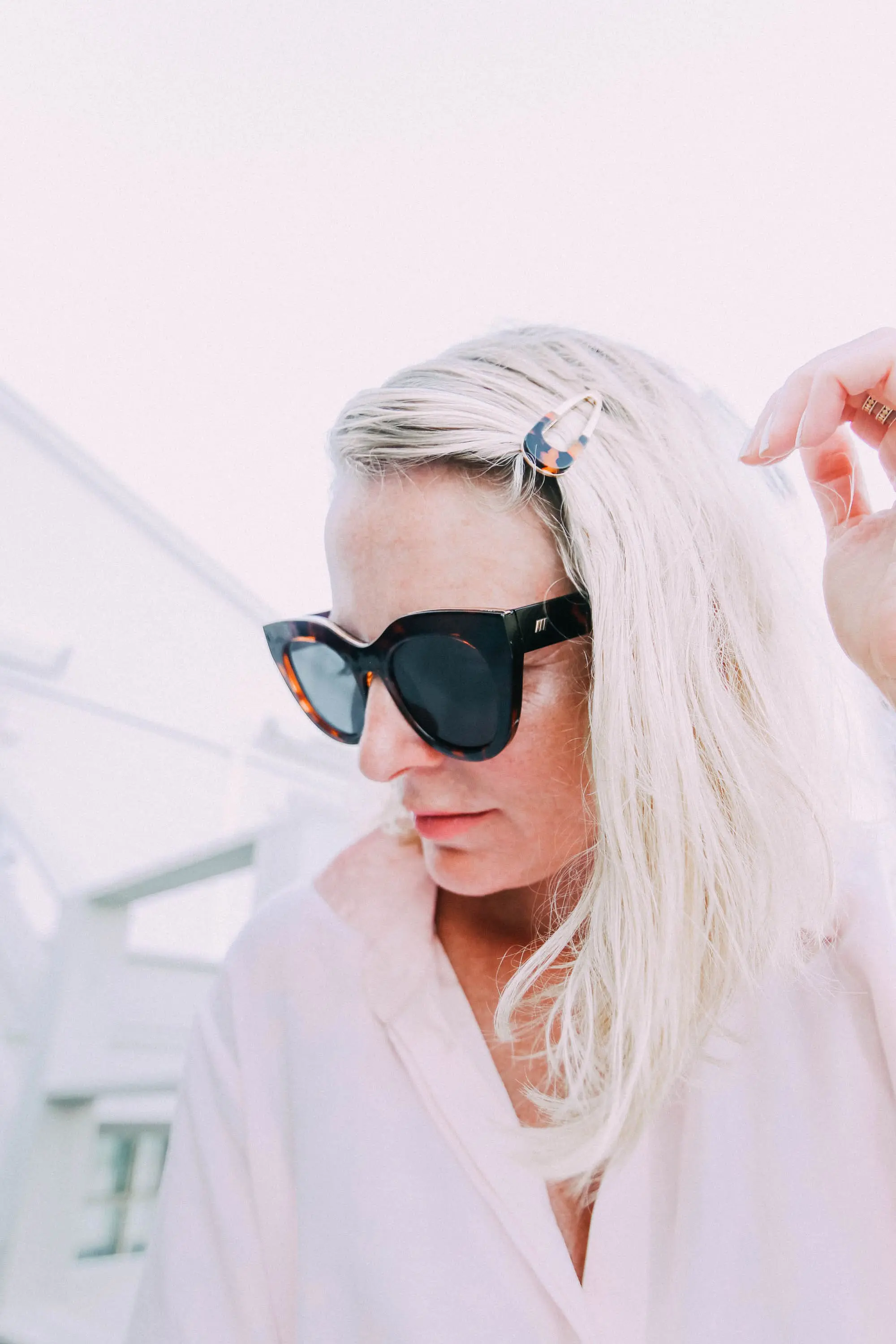 Hair Accessories, Fashion blogger Erin Busbee of BusbeeStyle.com wearing a tortoise and gold hair clip at the beach in Florida